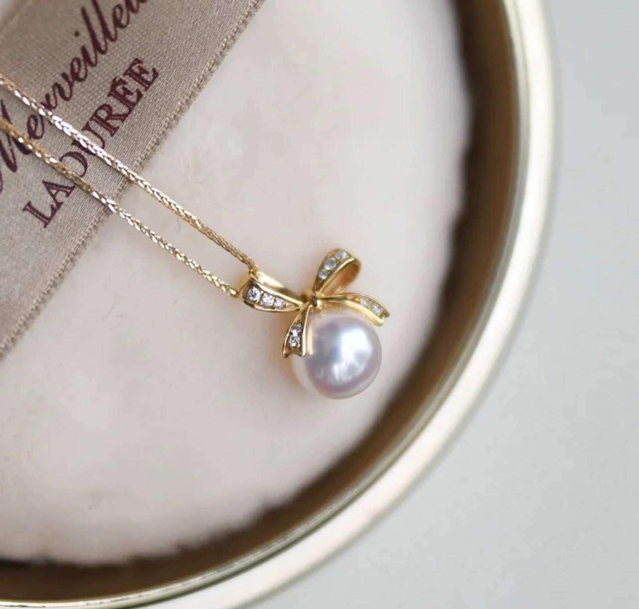 Bow Tie Knot Pearl Pendant Necklace