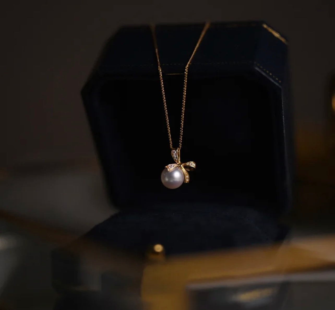 Bow Tie Knot Pearl Pendant Necklace