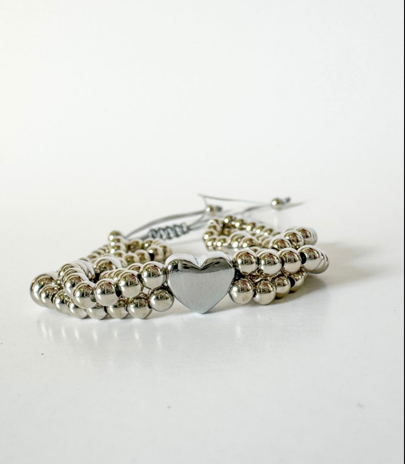 HEART GOLD AND SILVER BRACELET