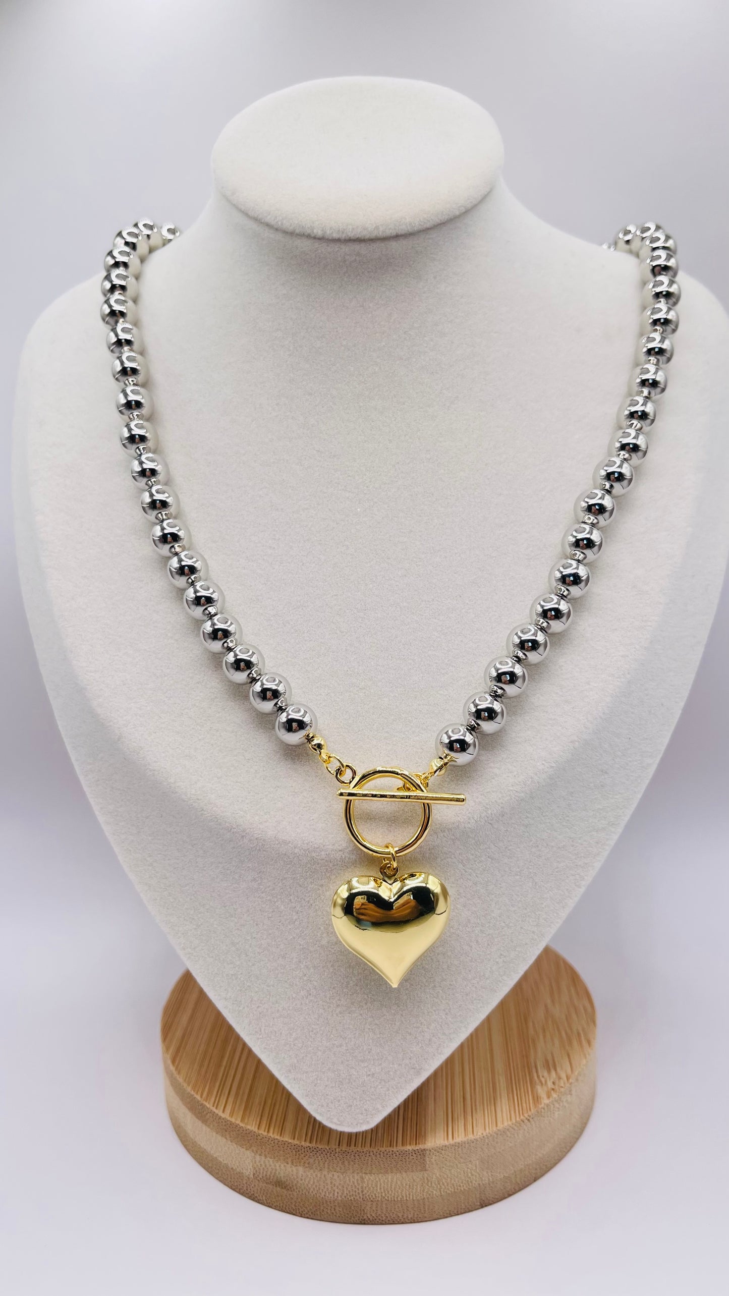 GOLD HEART AND SILVER NECKLACE