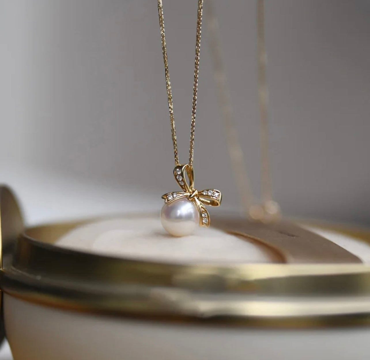 Bow Tie Knot Pearl Pendant Necklace