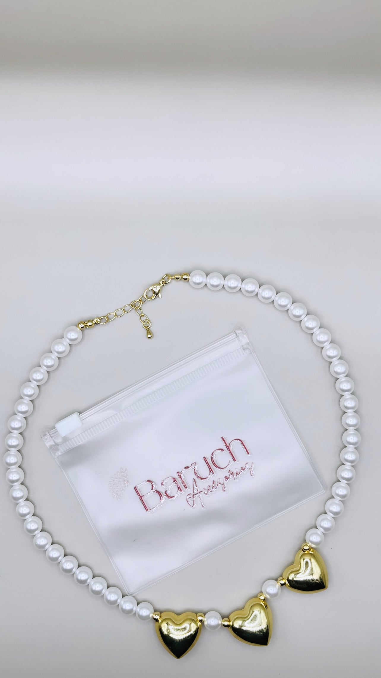 TRIPLE HEARTS PEARLS NECKLACE